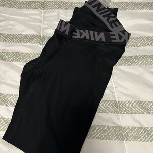 2 pairs of Nike compression pants